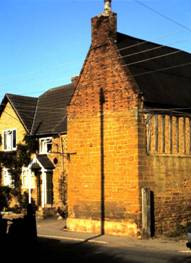 WH Guilsborough Rd Stone House 1 - A view of the surviving timber studding (15th or 16th century?) in the end wall of Stone House.